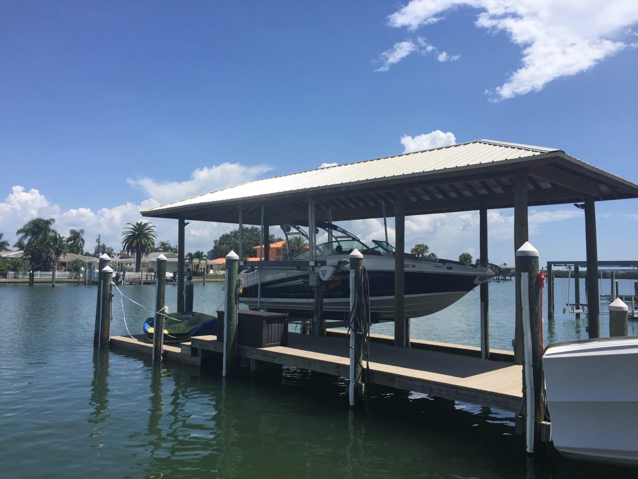 Hip Roof over Boat Lift | Gulfside Docks